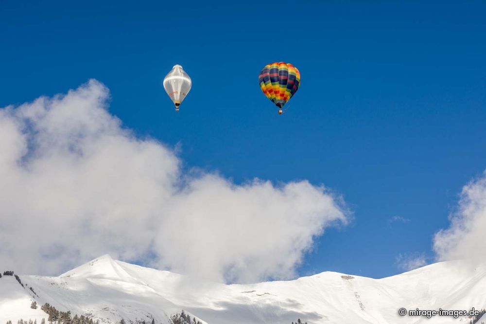 40th International Hot Air Balloon Festival - balloons are flying in the blue sky over the swiss mountain scenery
Ch�teau-d��x
